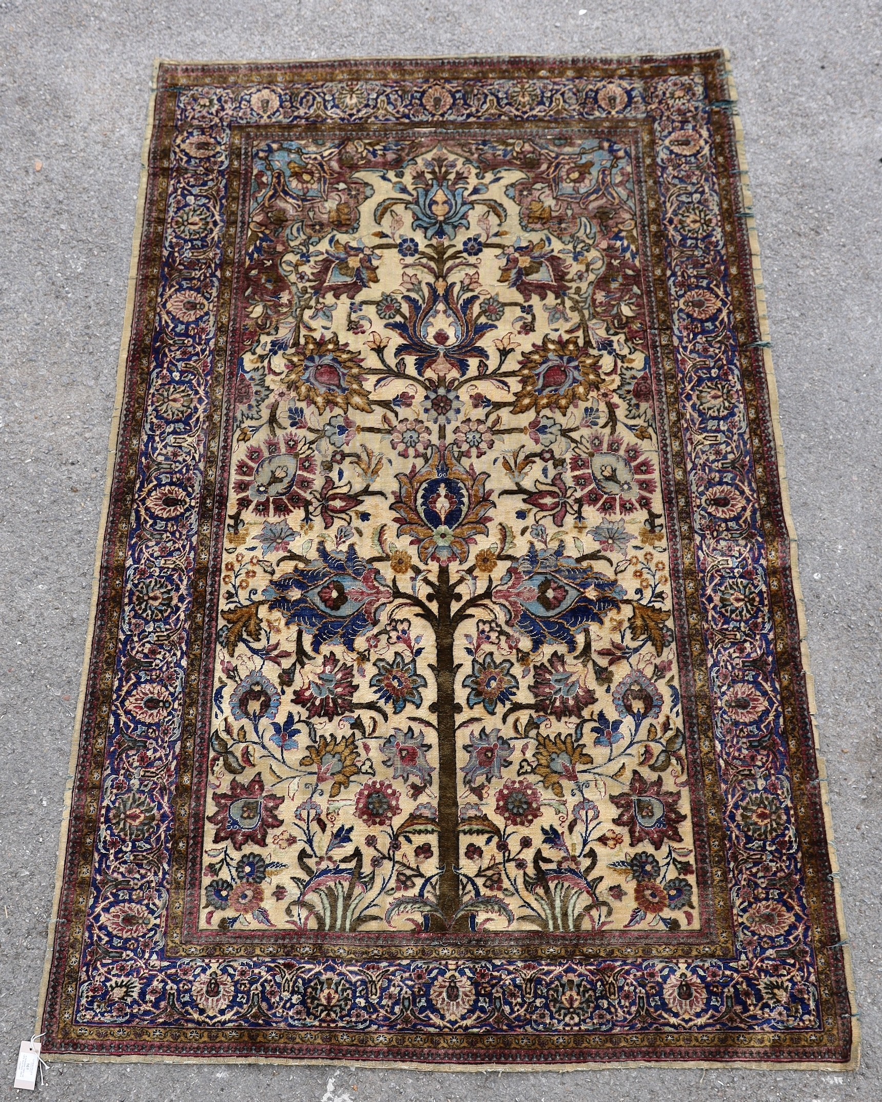 A Persian tree of life silk rug, 206 x 128cm